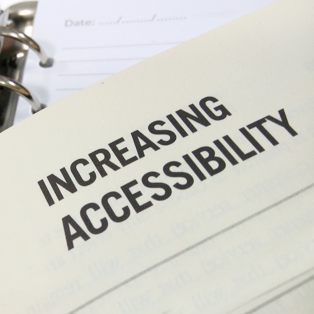 the words "increasing accessibility" written on paper