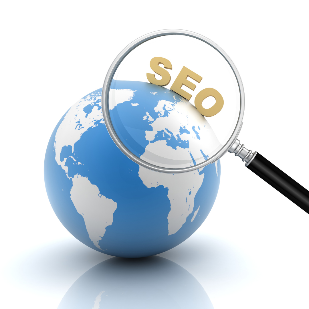 picture of a globe with a magnifying glass with SEO written on it. Symbolizes the reach of BigCommerce SEO