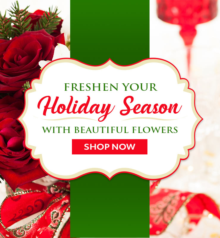 Holiday banner with red roses, white lilies, and berries beside text “Freshen your holiday season with beautiful flowers” and SHOP NOW button.