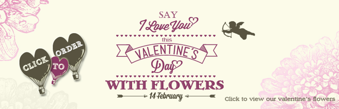 Valentine’s banner with heart hot-air balloons and cupid; text reads “Say I Love You this Valentine’s Day with Flowers”; "Click to view our Valentine’s flowers” call-to-action.
