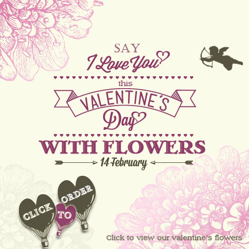 Valentine’s banner with heart hot-air balloons and cupid; text reads “Say I Love You this Valentine’s Day with Flowers”; "Click to view our Valentine’s flowers” call-to-action.